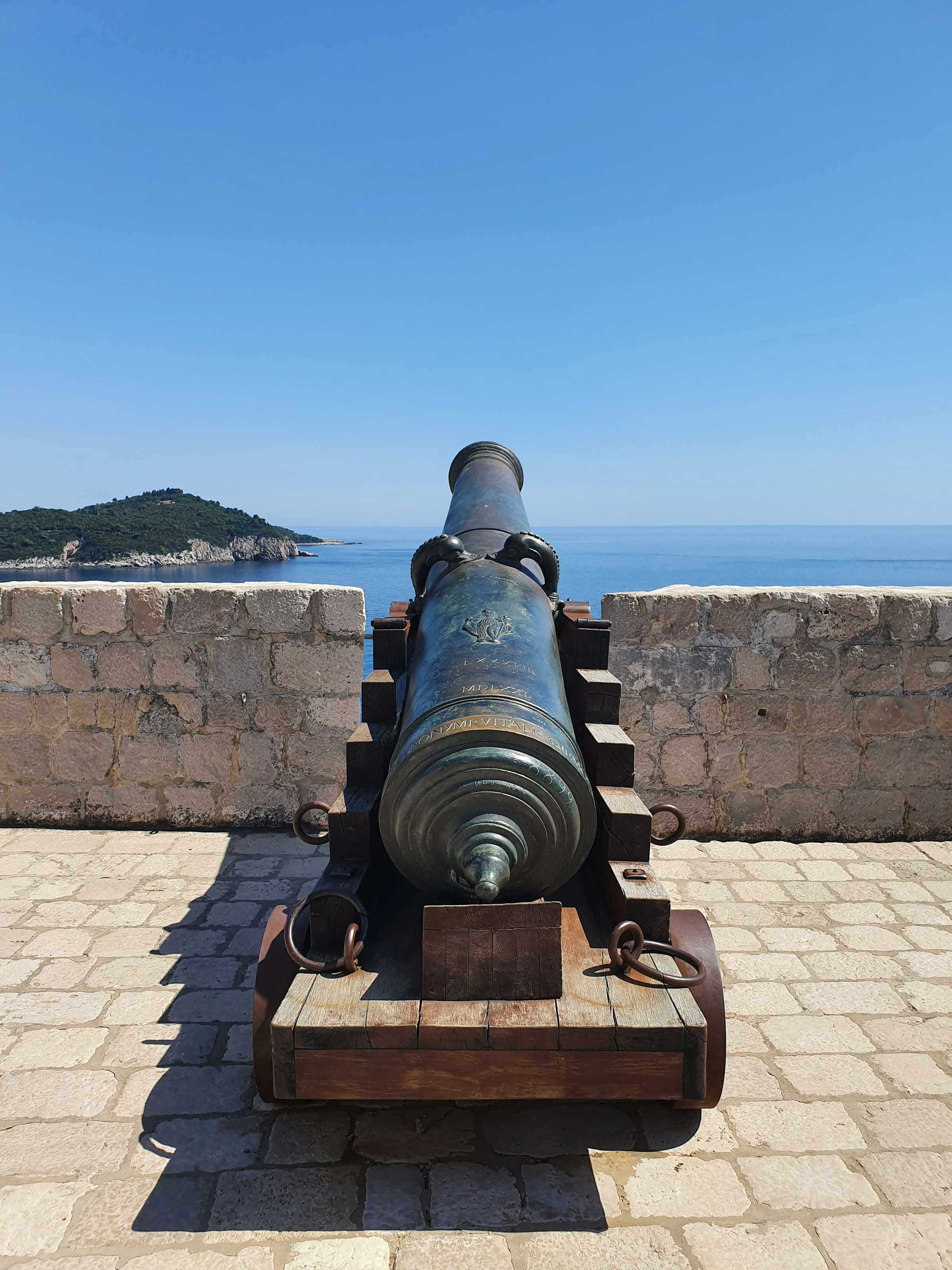 image of a cannon aimed at a bay by maximilian unsplash